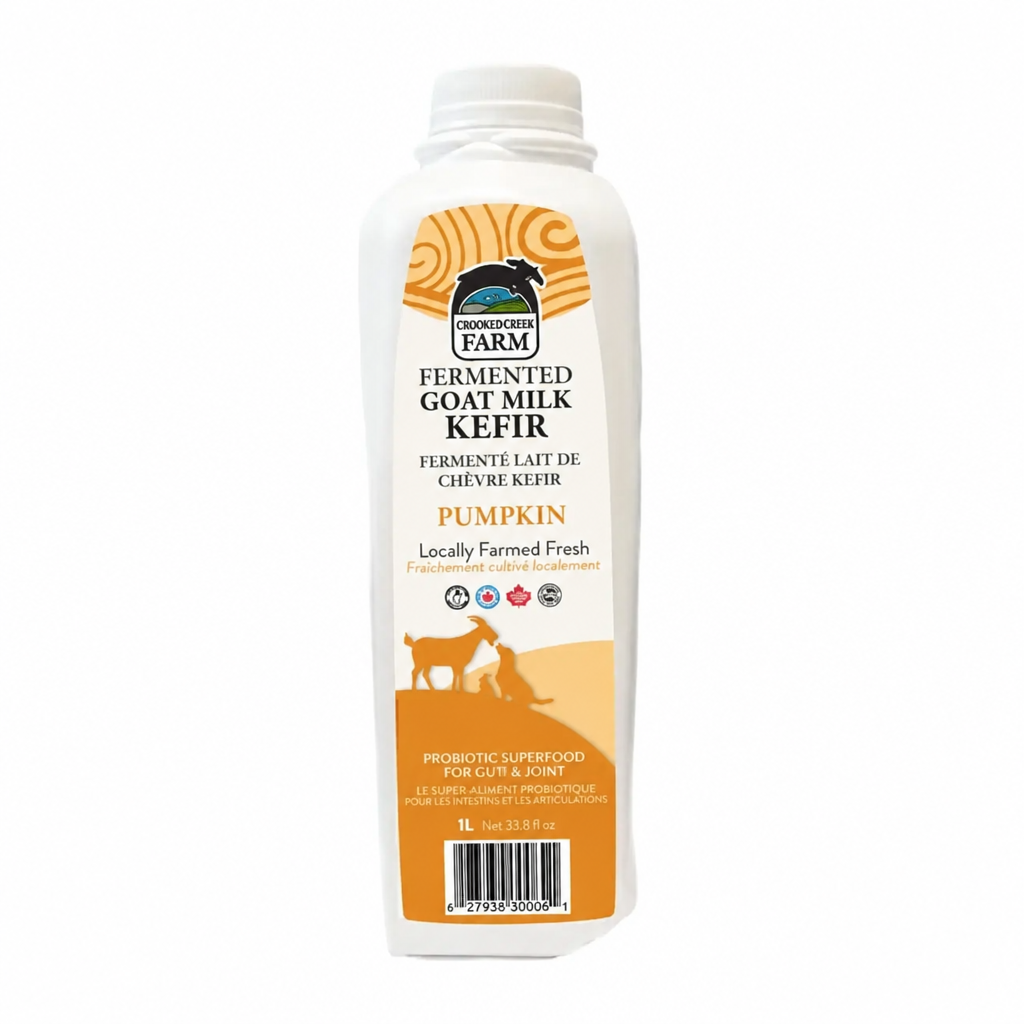 Fermented goat kefir bottle with pumpkin flavor on a white background