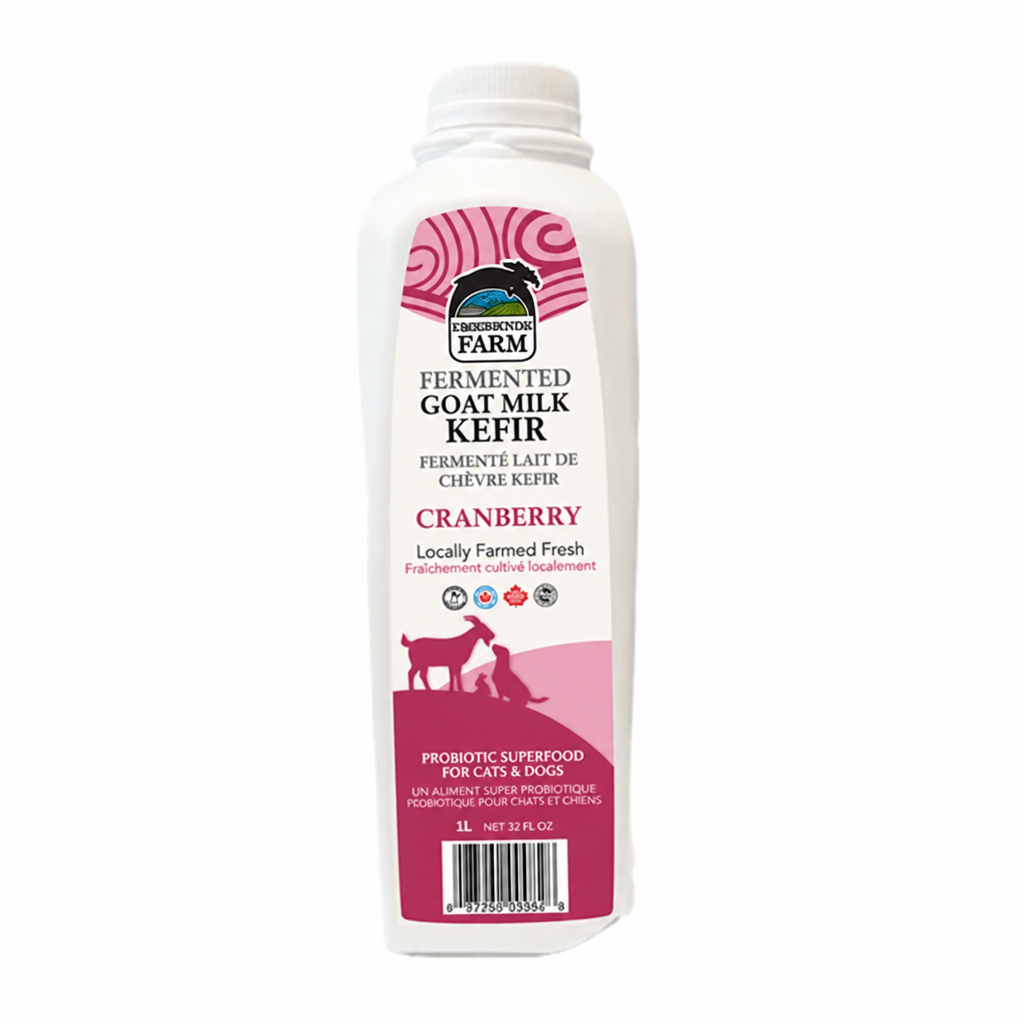A white plastic bottle of Organic Farm Fermented Goat Milk Kefir in Cranberry flavor, shown against a plain white background with a blue diagonal 'BILINGUAL' banner overlay in the top-left corner.
